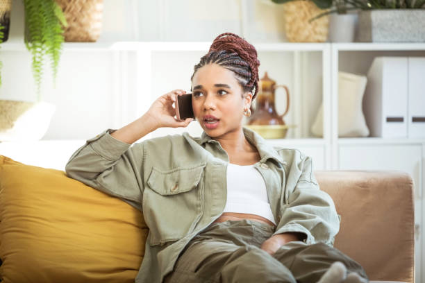 istock Young women using smart phone at home 1942523628