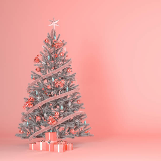 istock peach color pastel color Christmas tree concept background 3d render. 1942530987