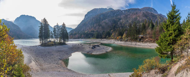 istock The walking path runs along a beautiful mountain lake 1942638456
