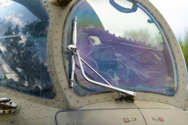 istock Old Soviet-made camouflage Mi-24 military helicopter cockpit 1942644892