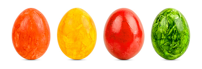 Young Australian girl holds a bowl of dyed Easter eggs