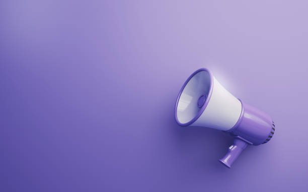istock Purple & White Megaphone on Soft Yellow Background 1942691684