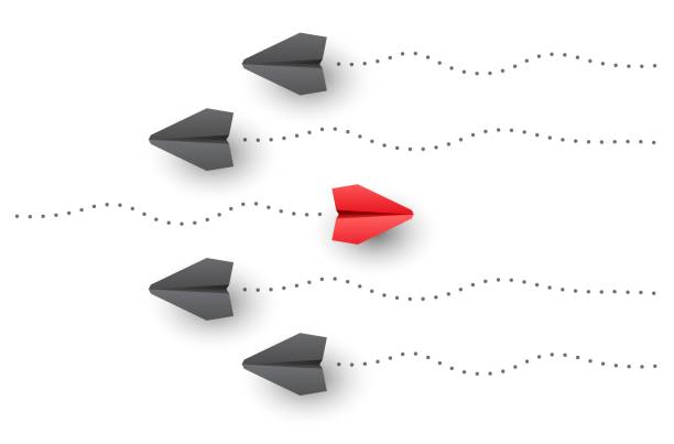 istock Individuality concept. Think different. Individual and unique red paper plane flies to opposite side. Vector 1942782616