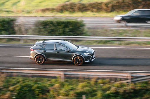 Santander, Spain - 12 January 2024: A Cupra Formentor in motion on a highway