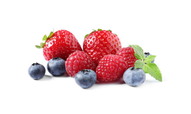 istock Many different ripe berries and mint leaves isolated on white 1942802603