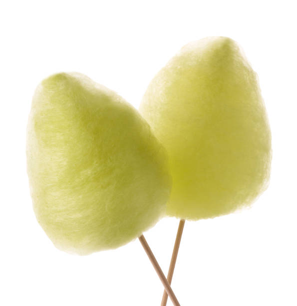istock Two sweet yellow cotton candies isolated on white 1942803047