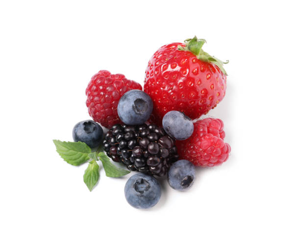 istock Many different ripe berries and mint leaves isolated on white 1942803058