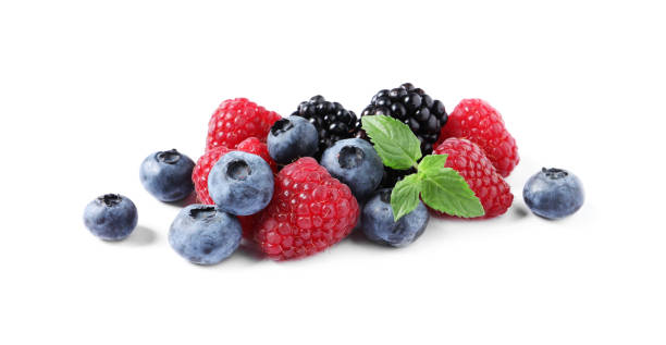 istock Many different ripe berries and mint leaves isolated on white 1942803067