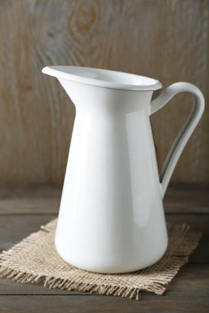 istock One beautiful white jug on wooden table 1942814678