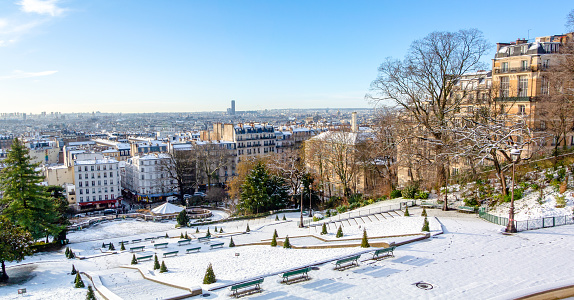 Paris, France, 18th of January 2024, Aerial view of Square Louise Michel in Montmartre under snow,