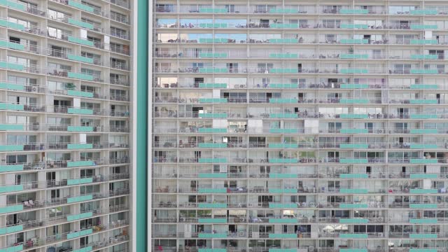 Time lapse of a large building's reflective windows in 4k