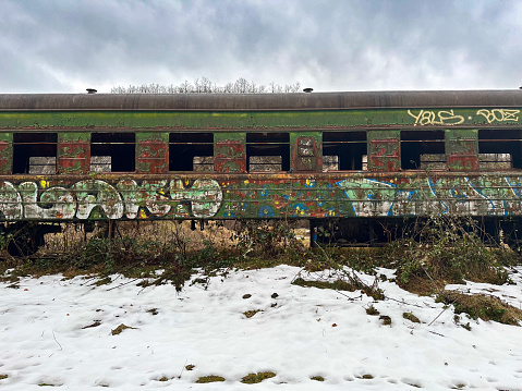 Abandoned old train carriage  with writings on it, Chiatura in Georgia, 01/06/2024