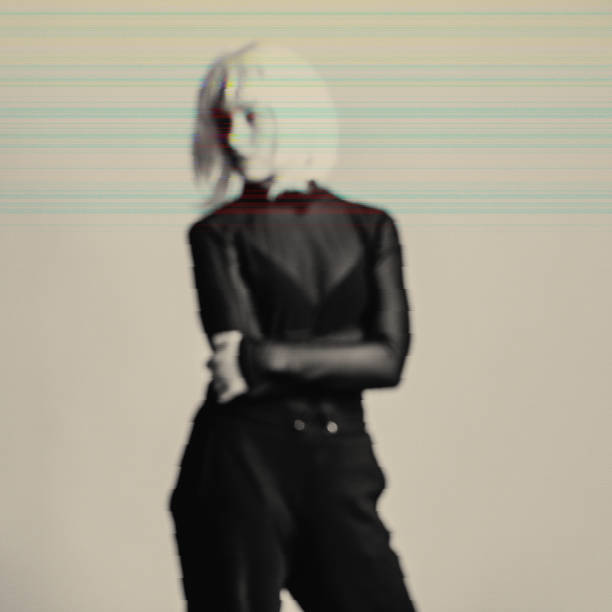 istock Abstract blurred woman silhouette in white studio background in glitch effect style 1942933721