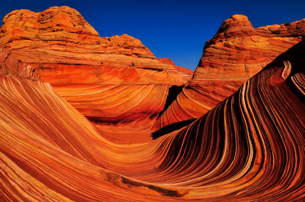 istock Sunrise on The Wave sandstone formation 1942941778
