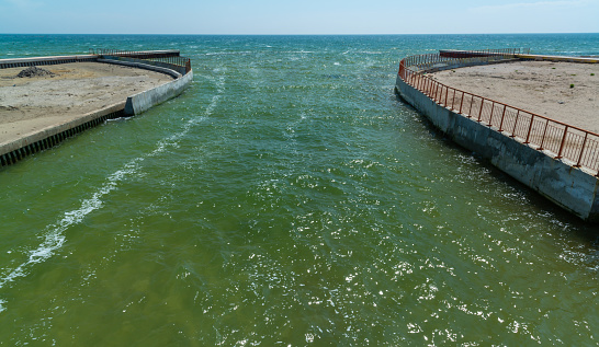 UKRAINE, KOBLEVO - MAY 01, 2021: Hydraulic structure, artificial canal in Tiligul estuary, southern Ukraine
