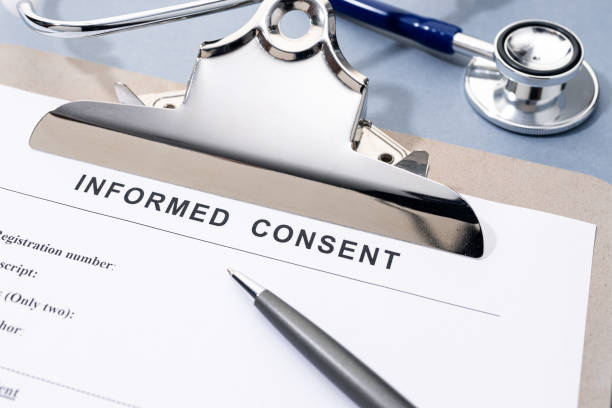 istock Informed Consent form pen and stethoscope on desk 1943009591