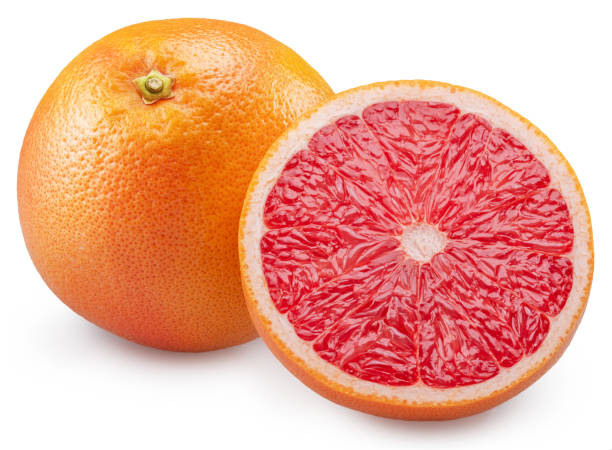 istock Red grapefruit and grapefruit cross section on white background. File contains clipping path. 1943012312