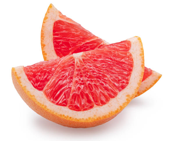 istock Slices of red grapefruit on white background. File contains clipping path. 1943012313