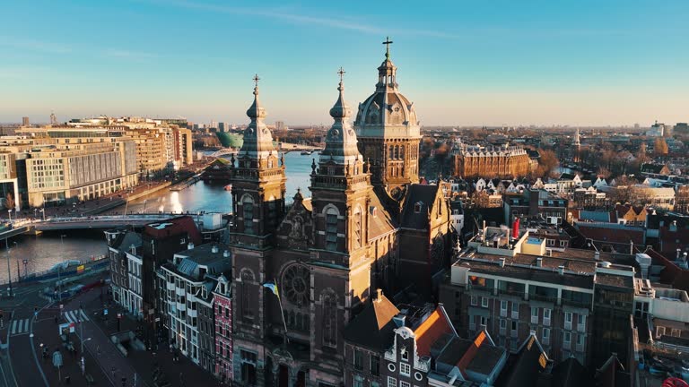 Aerial view of Amsterdam Saint Nicholas basilica at sunset, A Church in Amsterdam, St. Nicholas Church in Amsterdam, Church of Saint Nicholas in Amsterdam