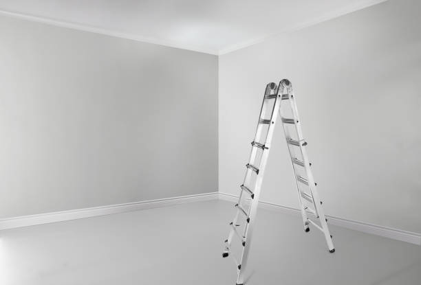 istock Metal ladder in an empty room 1943031728