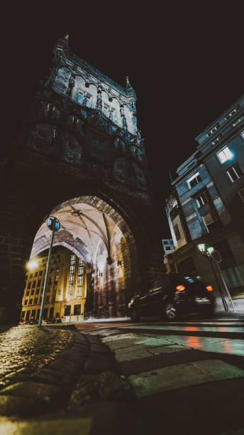 istock old tower in the city at night 1943044446