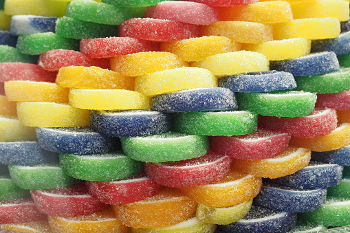 Stack of colorful candy sweet jelly closeup.
