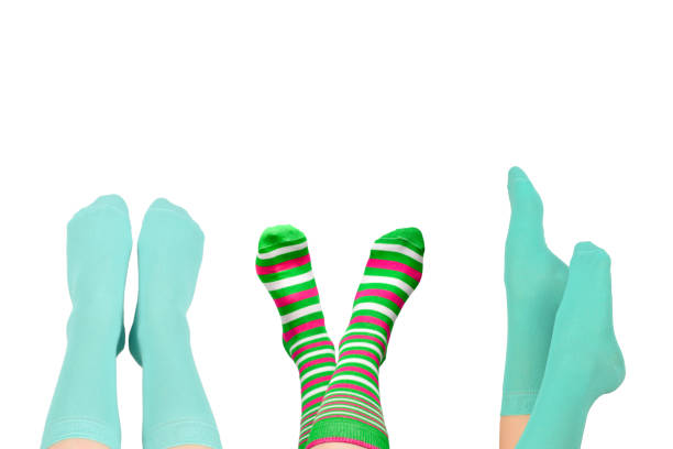 istock Woman in blue socks isolated on white background. Top view. 1943071187