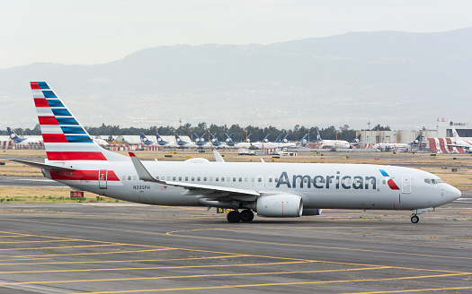 Ciudad de Mexico, Mexico – January 14, 2024: American Airlines airplane parked on runway at airport
