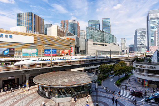 Tokyo, Japan - September 26, 2023: Shinkansen N700 high-speed train operated by Japan Rail JR at Yurakucho railway station in Tokyo, Japan.