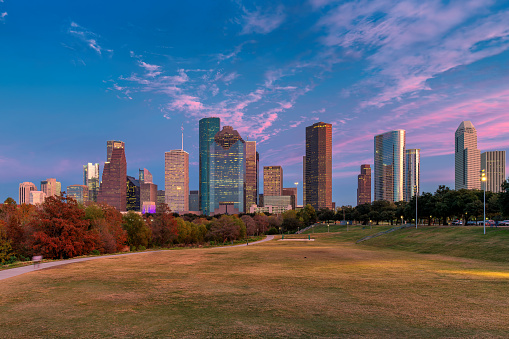 Houston downtown at pink sunset in Eleanor Tinsley Park, Houston, Texas, USA