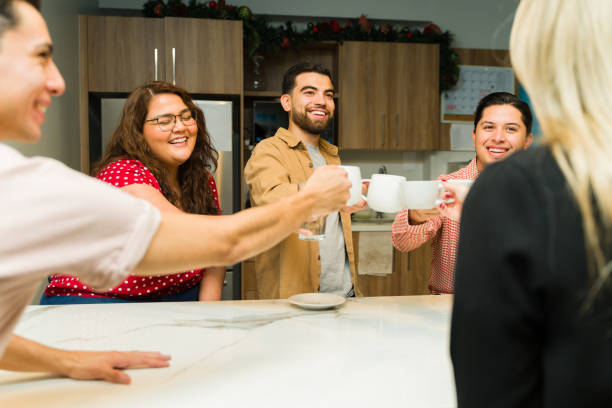 istock Businesspeople making a toast with their coffee cups during a work break 1943101847