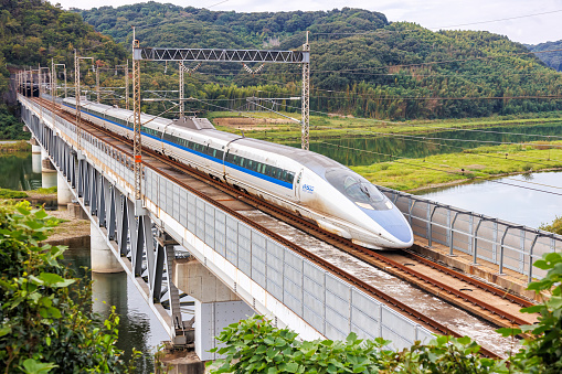 Kurashiki, Japan - October 1, 2023: Shinkansen 500 high-speed train operated by Japan Rail JR West on Sanyo Shinkansen line in Kurashiki, Japan.