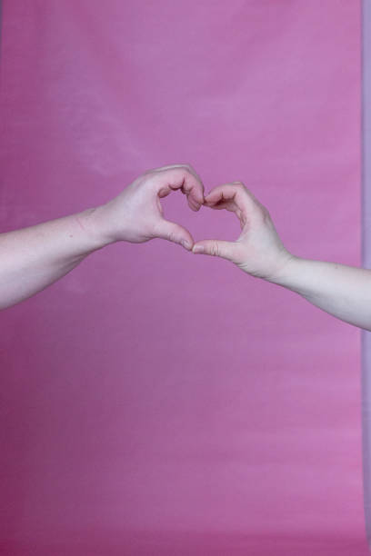 istock Two Person Heart Hand 1943123637