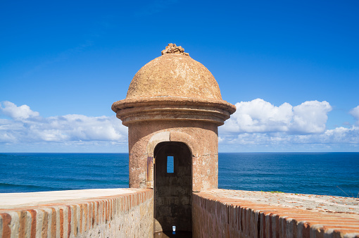 A cannon hole in Castillo San Felipe Del Morro or El Morro in old San Juan city, Puerto Rico. A significant political, iconic, historic location overlooking the Atlantic Ocean. It serve for cannon gun
