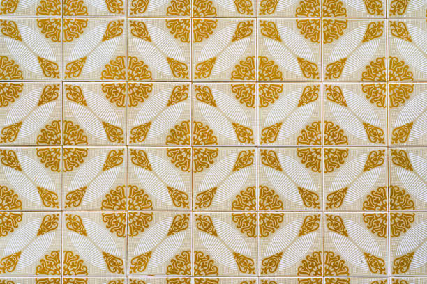 istock Ceramic square  tiles with small ornamental mosaic pieces. Old tiles abstract pattern 1943148347
