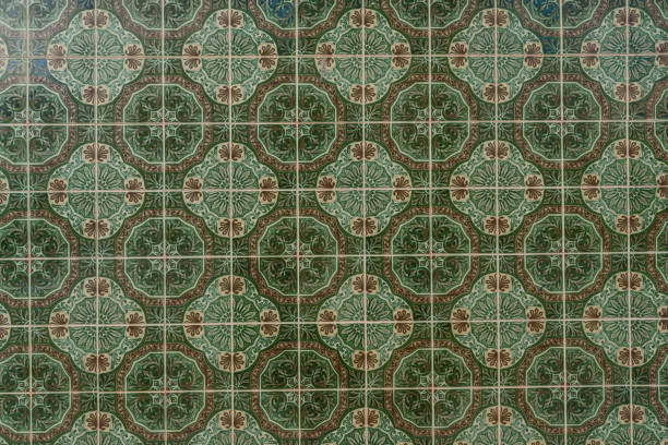istock Ceramic square  tiles with small ornamental mosaic pieces. Old tiles abstract pattern 1943155449