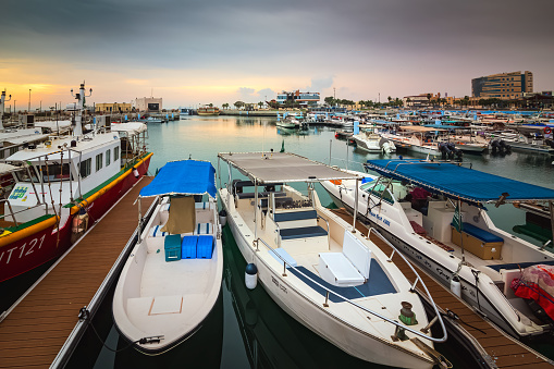 Golden Hour Harbor: Capturing the Tranquil Beauty of Sunrise in Fanateer Beach's Boats Yard, Al Jubail City