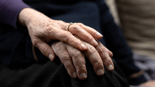 istock older couple holding hands of each other 1943194947