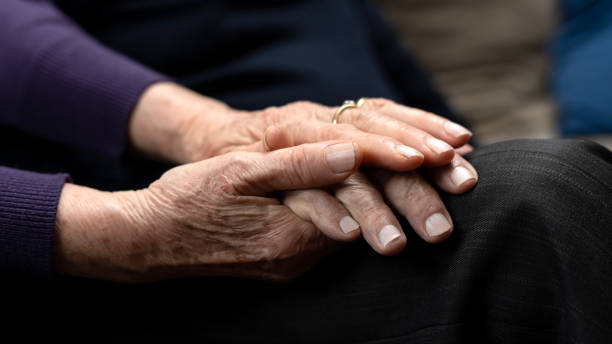 istock older couple holding hands of each other 1943194949