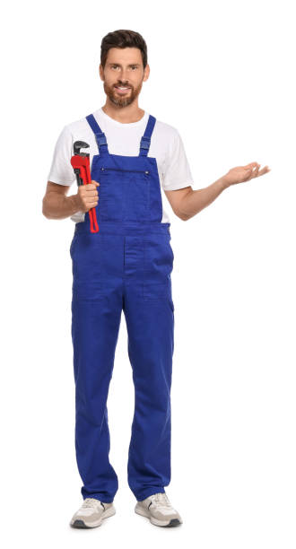 istock Professional plumber with pipe wrench on white background 1943277314