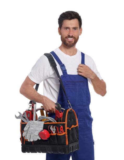 istock Professional plumber with tool bag on white background 1943278375