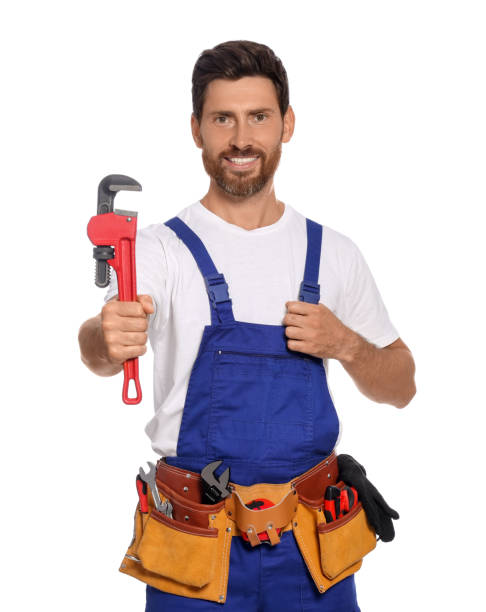 istock Professional plumber with pipe wrench and tool belt on white background 1943278389