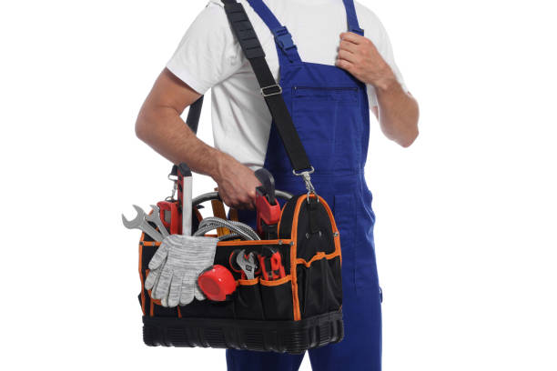 istock Professional plumber with tool bag on white background, closeup 1943282156