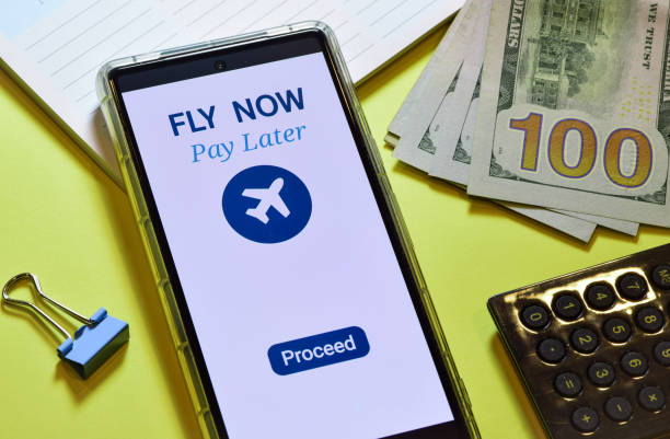 istock Mobile application for easy air travel. Fly now pay later digital display on smartphone. 1943327067
