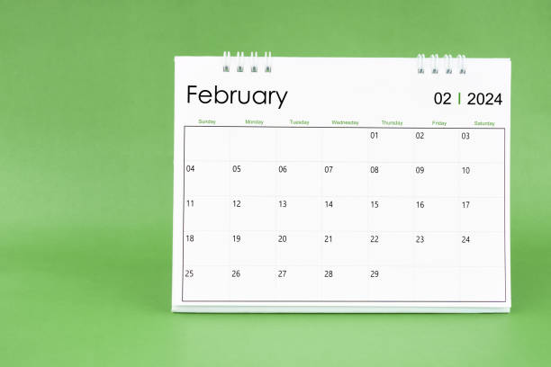 istock February 2024 desk calendar isolated in green background. 1943363177