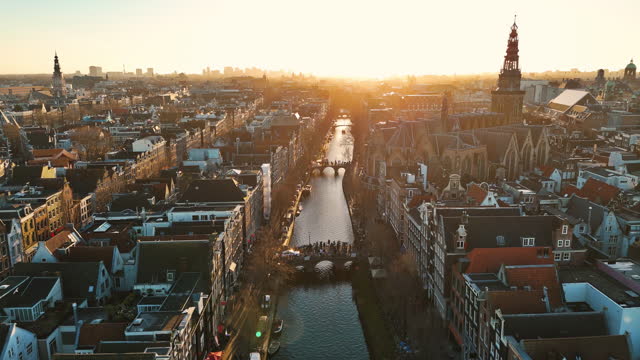 Aerial view of red light district,  Aerial view of famous places in Amsterdam, Netherlands, Canal view and old center district, Aerial view of row houses on Amsterdam canals, Amsterdam traditional old narrow houses, boats and canals, Red Light street