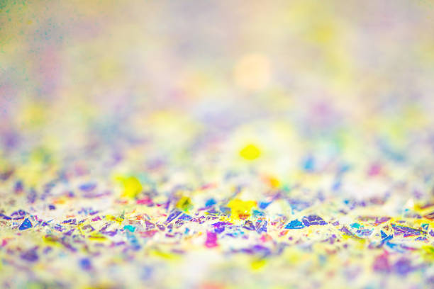 Colored confetti falling on floor