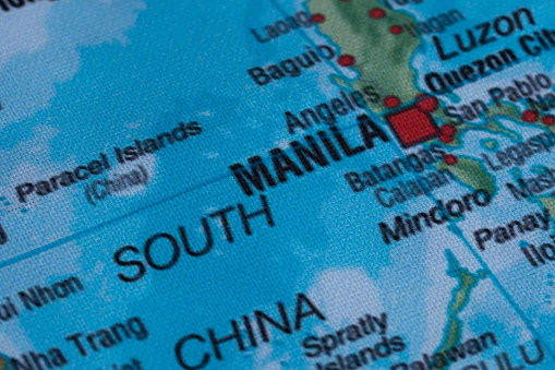 Map view of Manila on a geographical globe