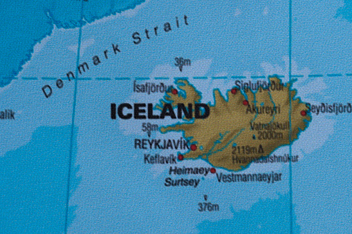 Map view of Iceland on a geographical globe