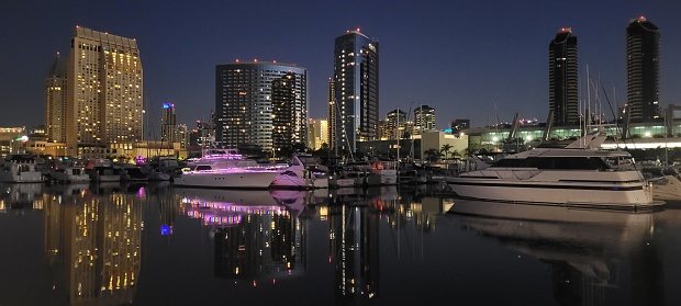 Vibrant and colorful Downton San Diego with beautiful reflections over San Diego Bay